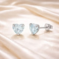 Brinco em Prata 925 com Zircônia Azul Claro em Formato de Coração 4mm