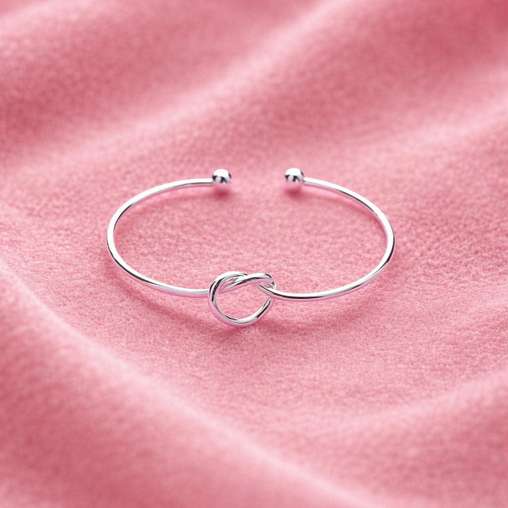 Bracelete em Aço Inoxidável com Nó Central e Extremidades Esféricas