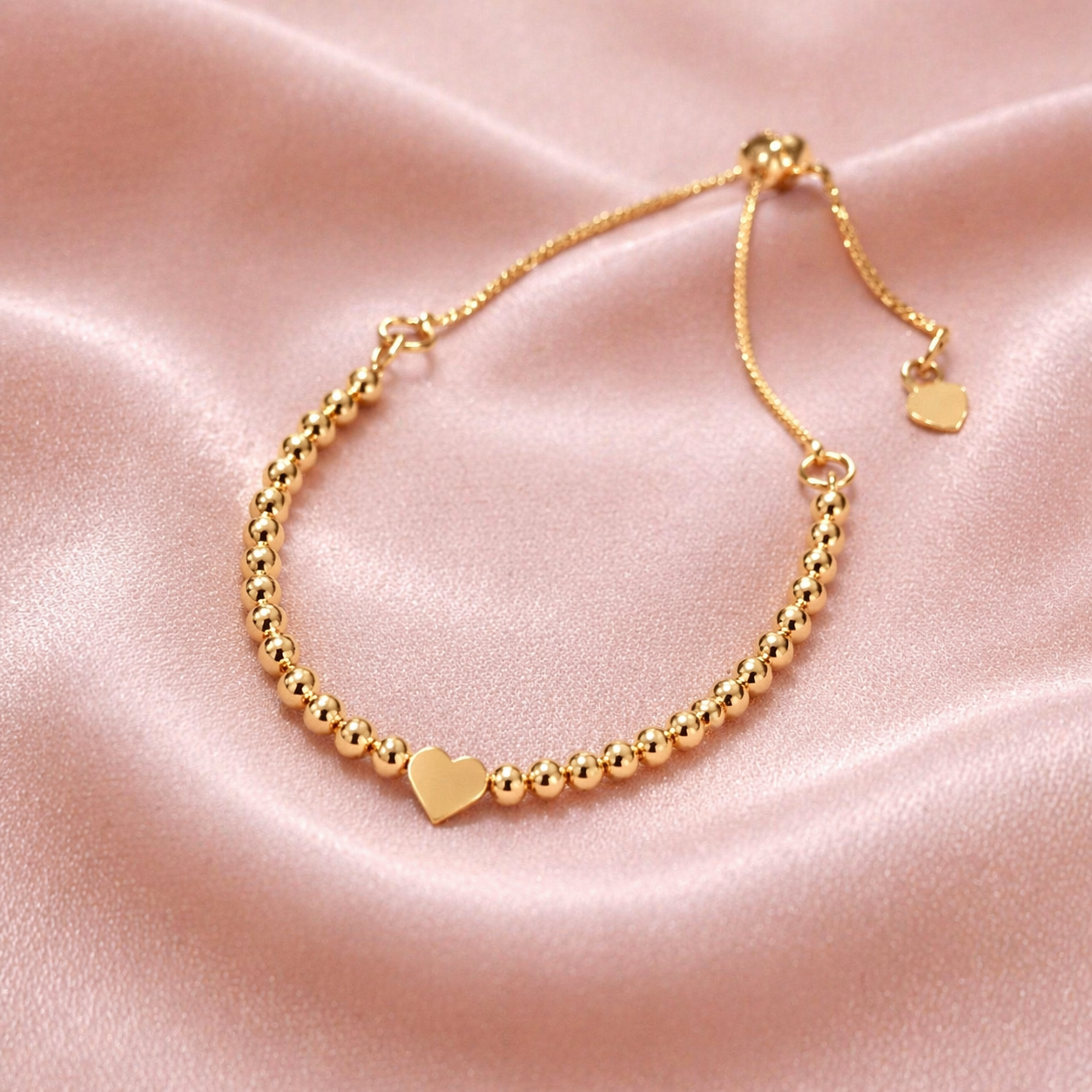 Pulseira de Esferas com Coração Banhada a Ouro 18k